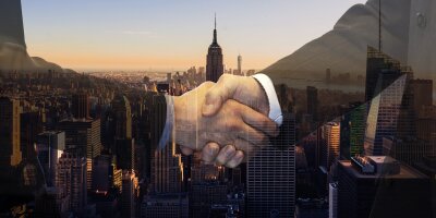 Handshake on city backdrop