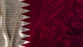 photo of the beautiful colored national flag of the modern state of Qatar on a textured fabric, concept of tourism, emigration, economy and politics, closeup