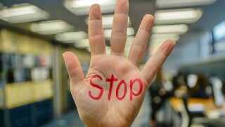 Harassment at work, woman sad angry terrified scared afraid, man, stop no, pressure unhappy male abuse touch hand, flirting bullying uncomfortable job.